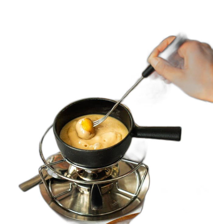 Cheese fondue on its burner